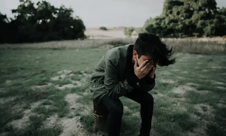 Man in distress outdoors